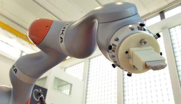 Robot Arm Brings Humanity Back to the Stone Age