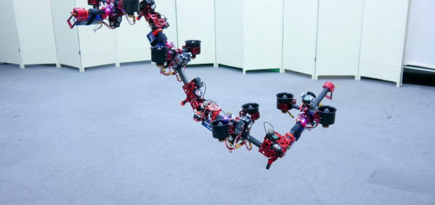 Flying Dragon Robot Transforms Itself to Squeeze Through Gaps